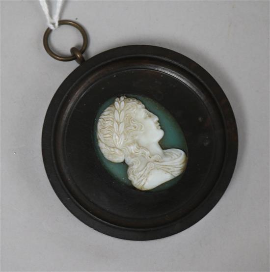 A 19th century miniature hardstone portrait bust of a classical female, H 3cm (bust); Dia 6cm (frame)
